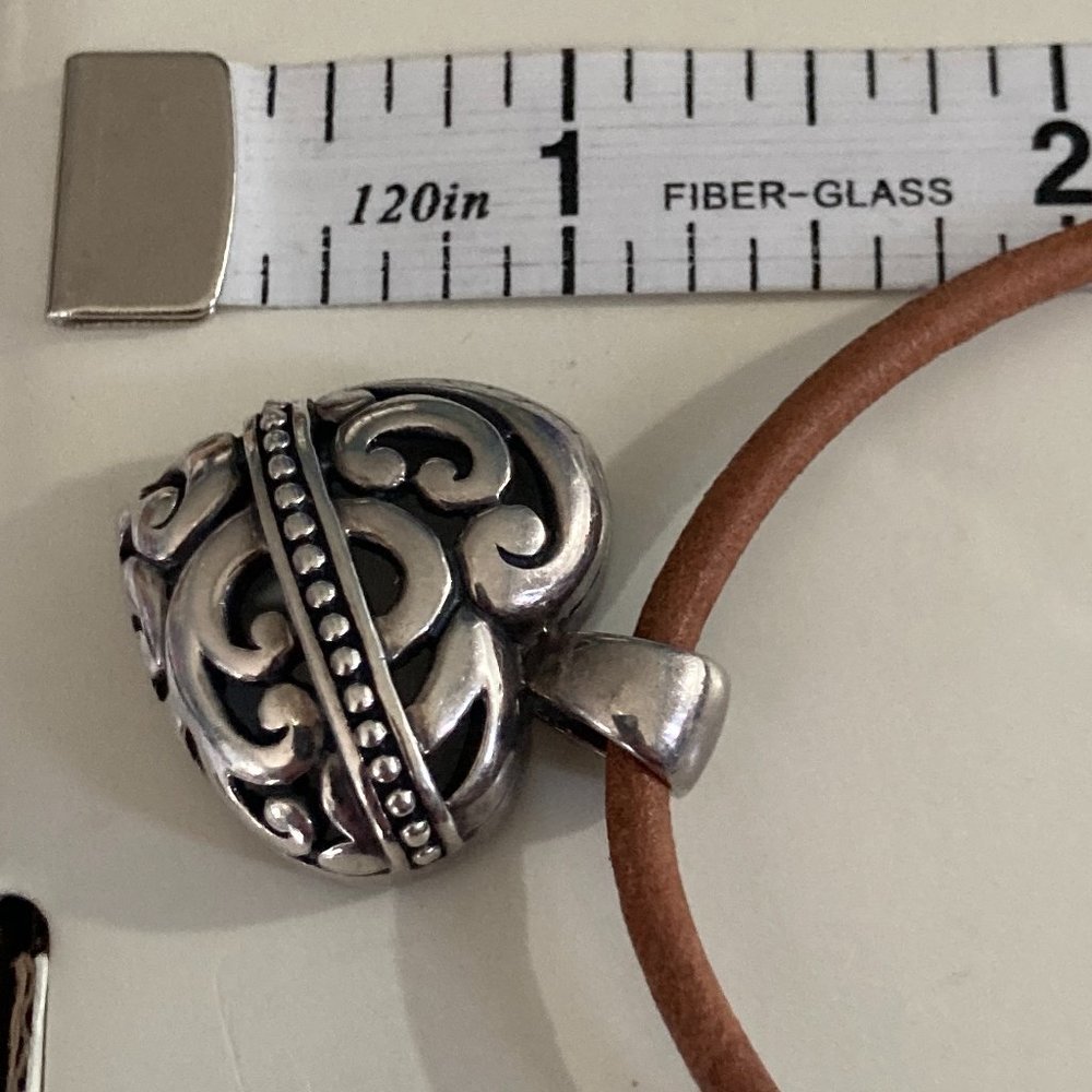 Stunning engraved open sterling silver heart on leather cord